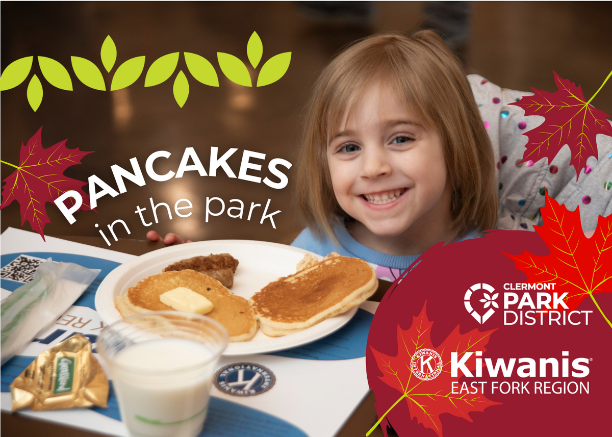 young park-goer smiling with her stack of pancakes with cartoon maple leaves and white text that reads "pancakes in the park"